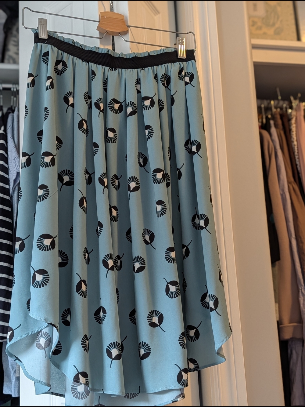 LOFT Blue High-Low Pleated Skirt with Black Floral Motif